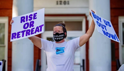 Terri Straka outside Socastee City Hall advocating for buyouts in 2020 with Rosewood Strong