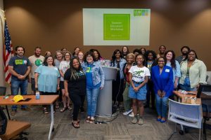 Marylee Orr (center) poses with LEAN members at their 2024 Summer Educators Workshop. Photo: LEAN