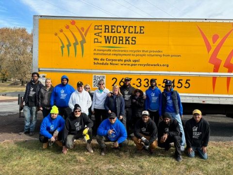team-in-front-of-truck